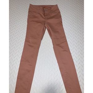 Mauve skinny jeans